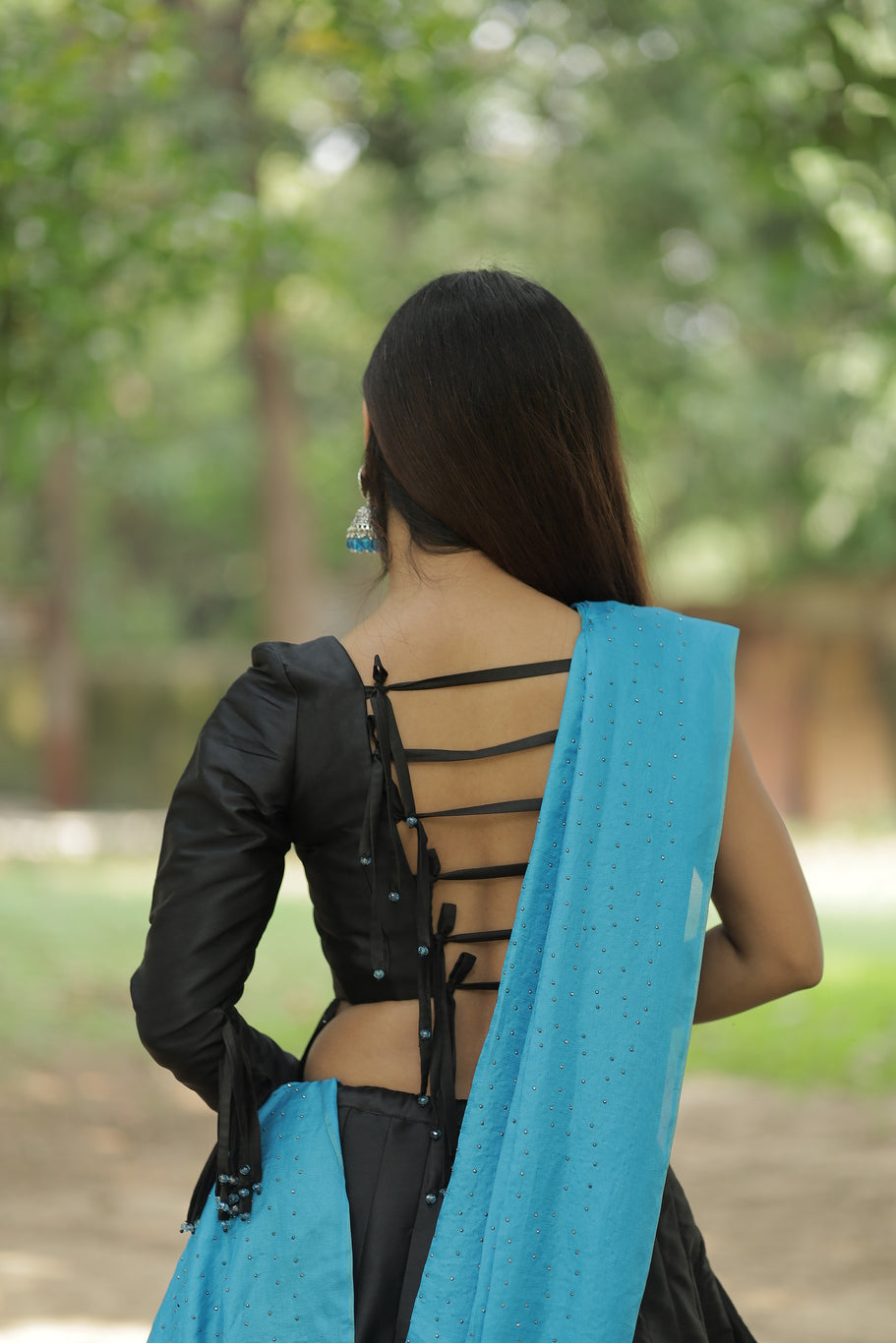 Black Asymmetric Multi Strip Blouse And Sleeve