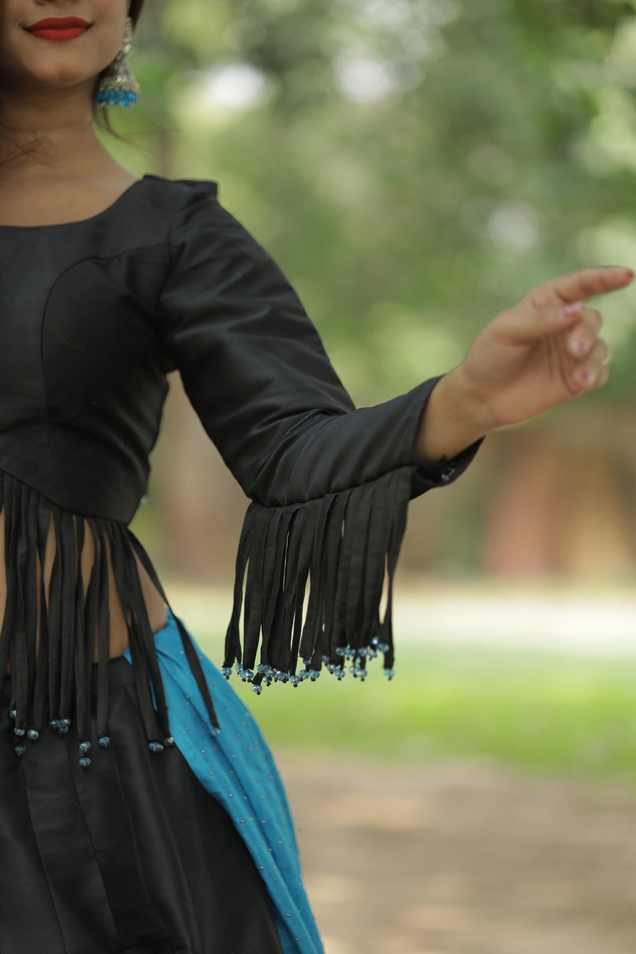 Black Asymmetric Multi Strip Blouse And Sleeve